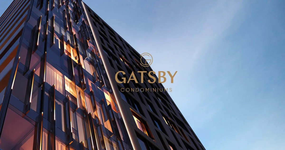 Le Gatsby condominium exterior in Montréal, with dark façades and illuminated balconies